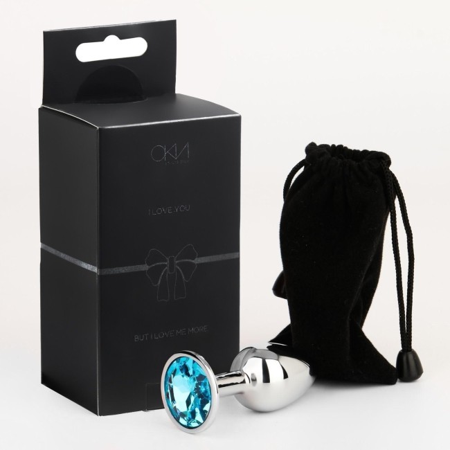 Серебристая анальная втулочка с голубым кристаллом - 7 см. Серебристая анальная втулочка с голубым кристаллом - 7 см.